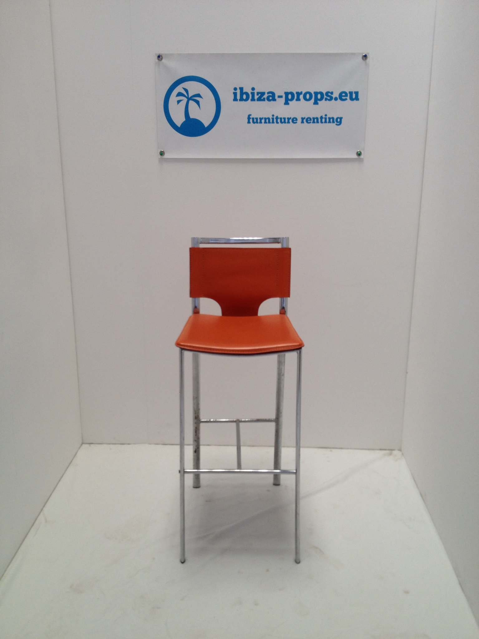 Bar stool orange metal to hire by ibiza-props