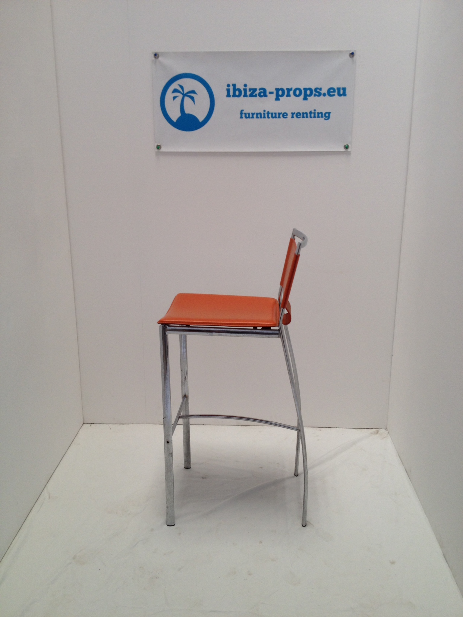 Bar stool orange metal to hire by ibiza-props