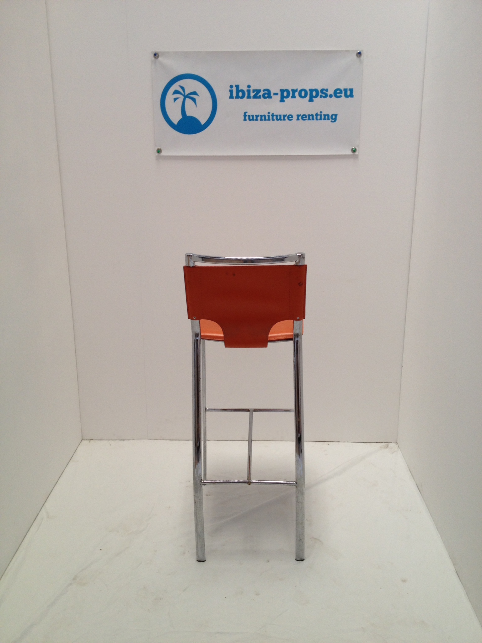 Bar stool orange metal to hire by ibiza-props