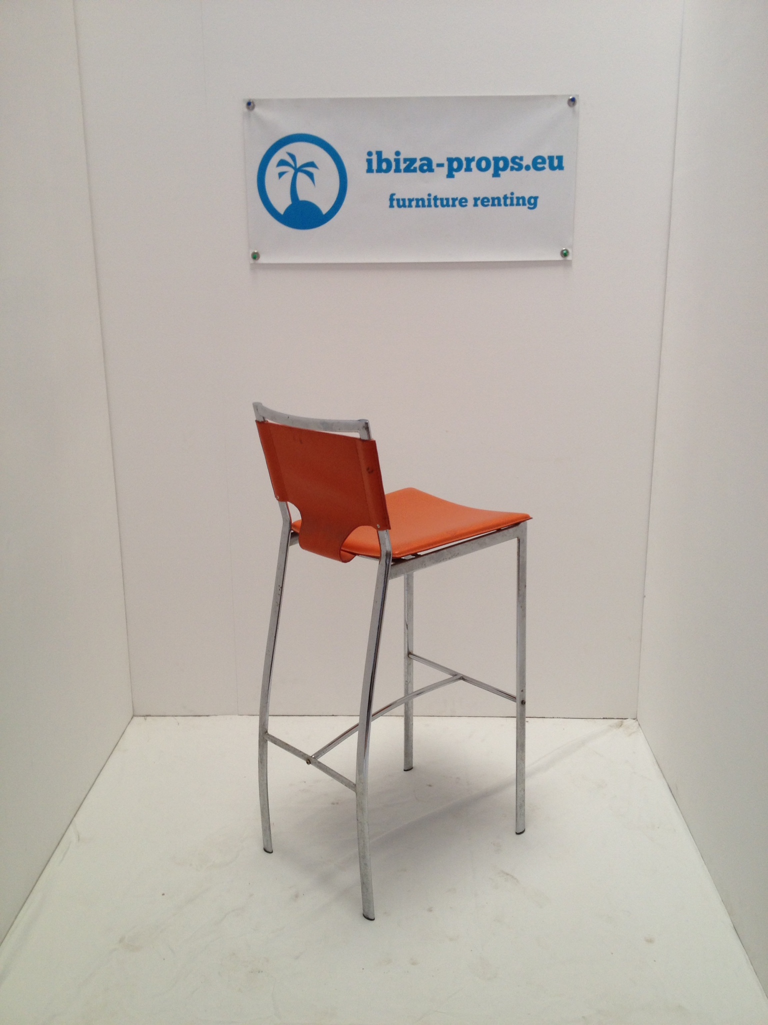 Bar stool orange metal to hire by ibiza-props
