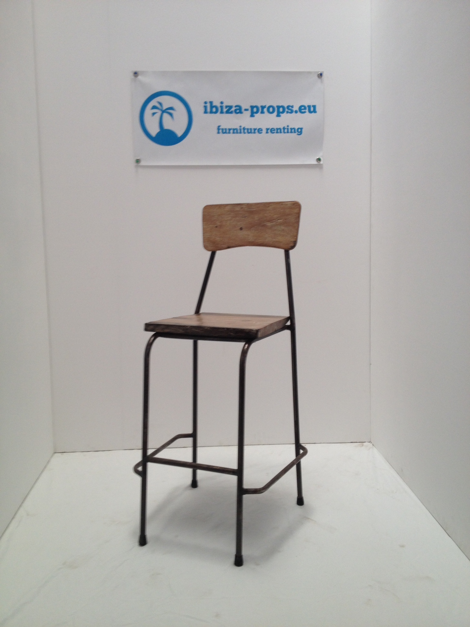 Brown wood metal bar stool to hire by ibiza-props