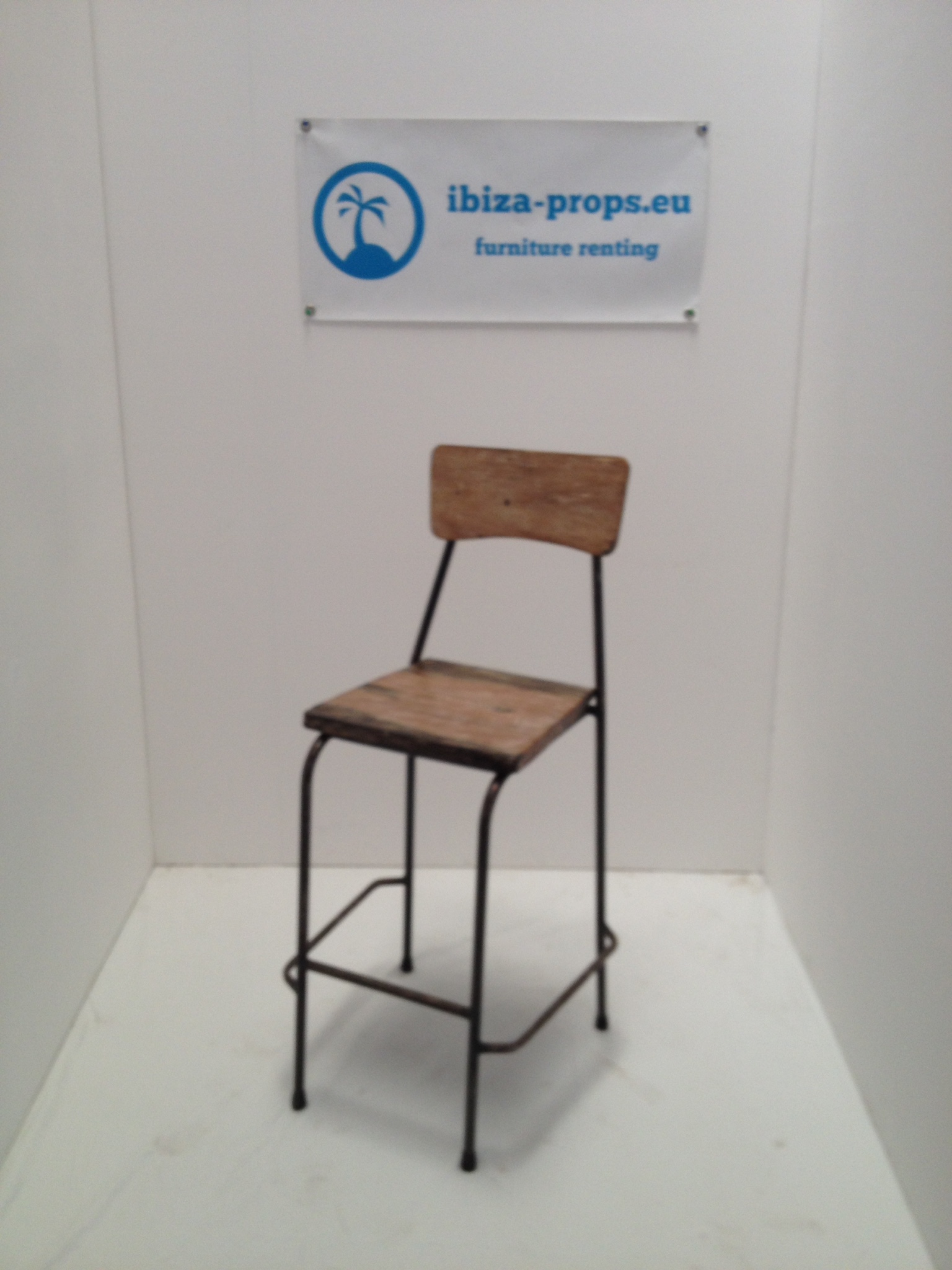Brown wood metal bar stool to hire by ibiza-props
