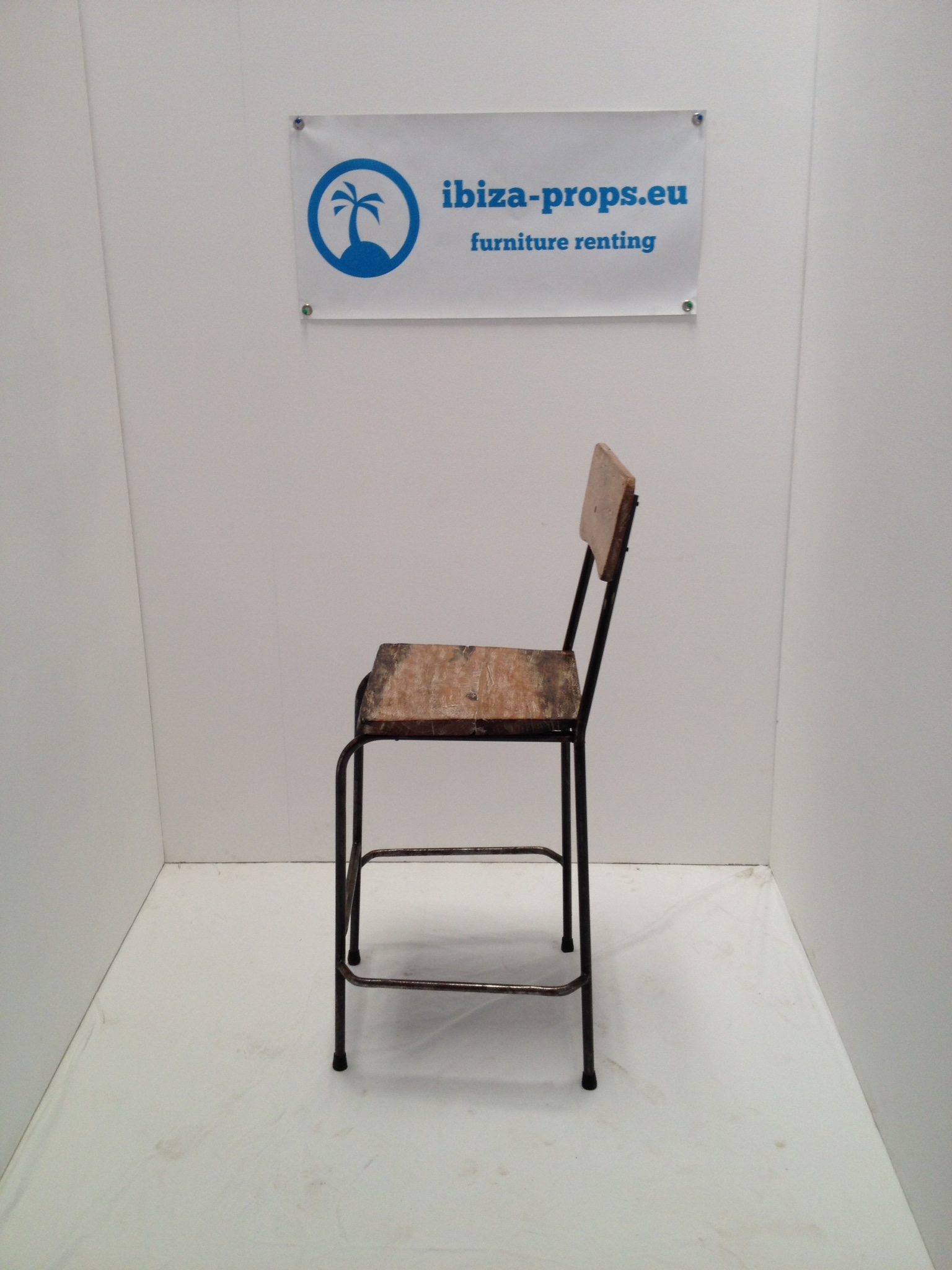 Brown wood metal bar stool to hire by ibiza-props